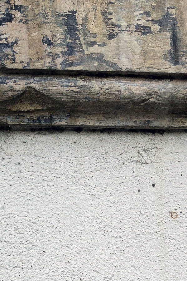 Photo 26173: No window. A worn, yellow sandstone frame