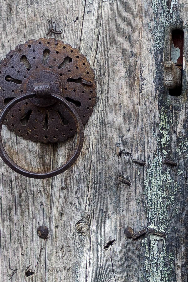 Photo 26209: Worn, carved, green and unpainted gate of boards