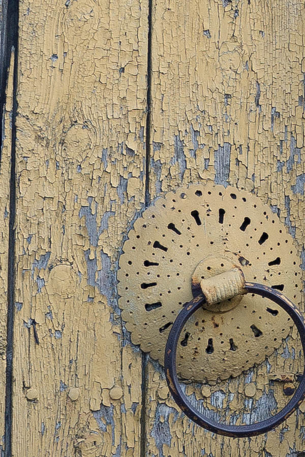 Photo 26211: Decayed, carved, yellow gate of boards