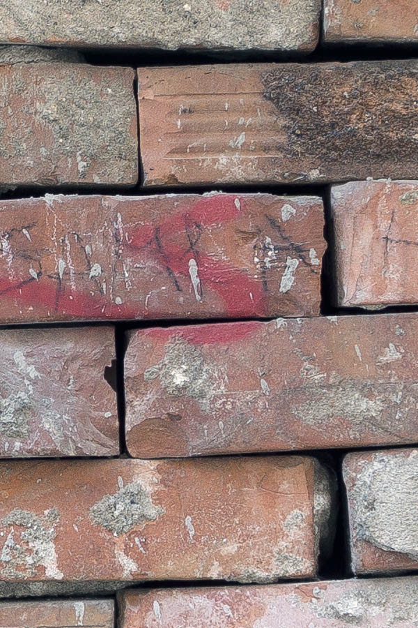 Photo 26221: No window: A decayed, light green window blocked with red bricks without mortar