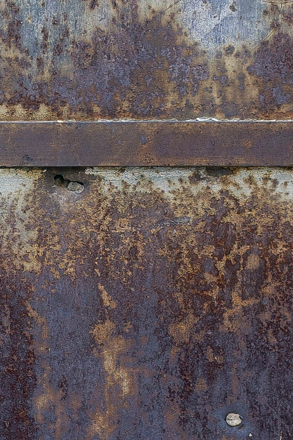 Photo 26254: Decayed, grey, brown, and rusty metal plate double door