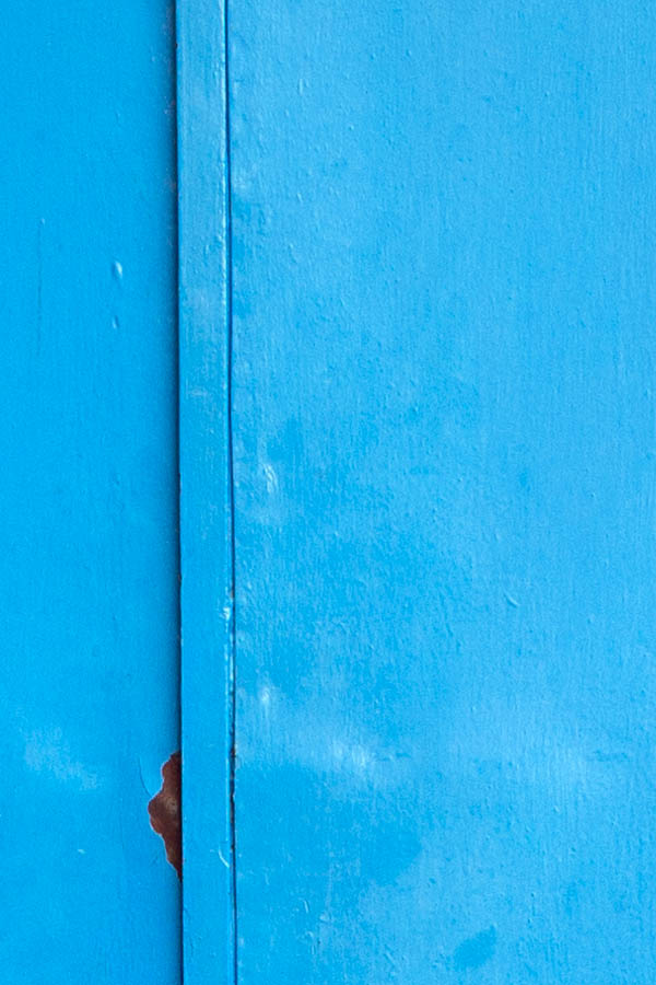 Photo 26420: Worn, light blue gate in three sections