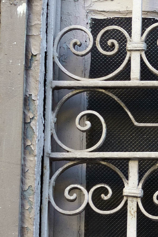 Photo 26455: Decayed, white window with lattice
