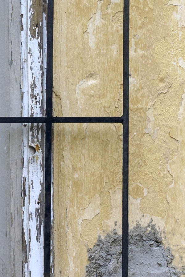 Photo 26620: Decayed, white window with grating