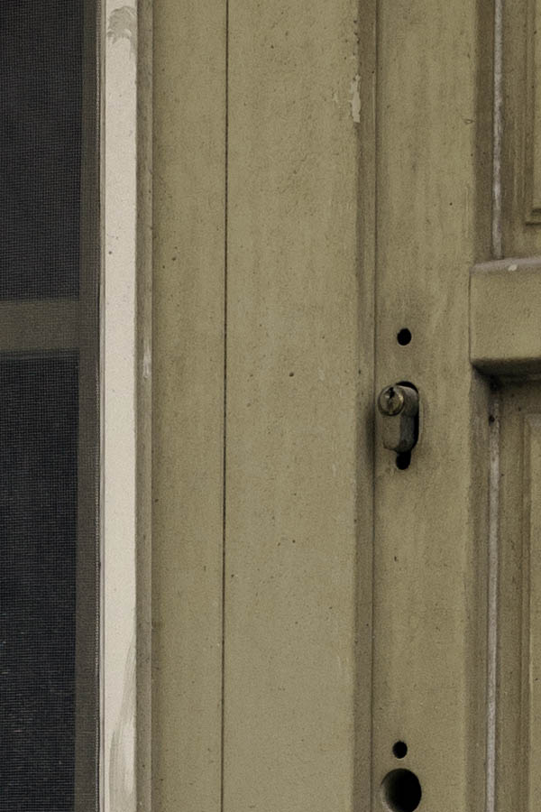 Photo 26621: Formed, light green window and door in a sandstone frame