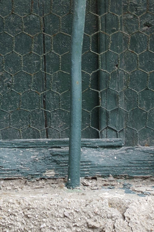 Photo 26652: Green, grated withdow with shutters
