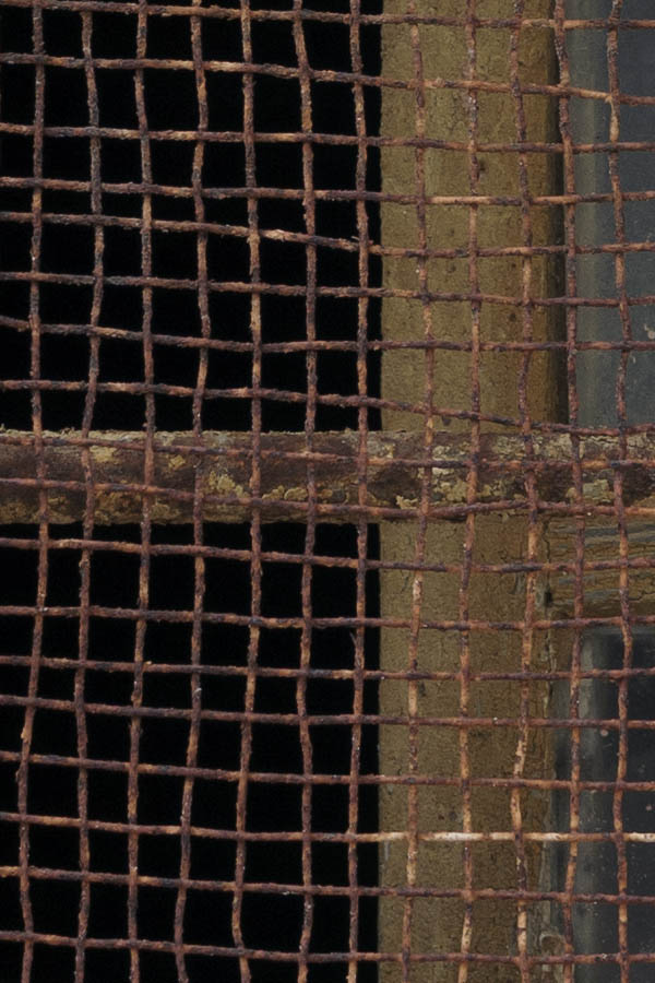 Photo 26661: Worn, green, grated and latticed window