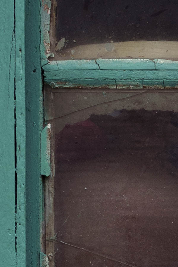 Photo 26693: Worn, green, grated window