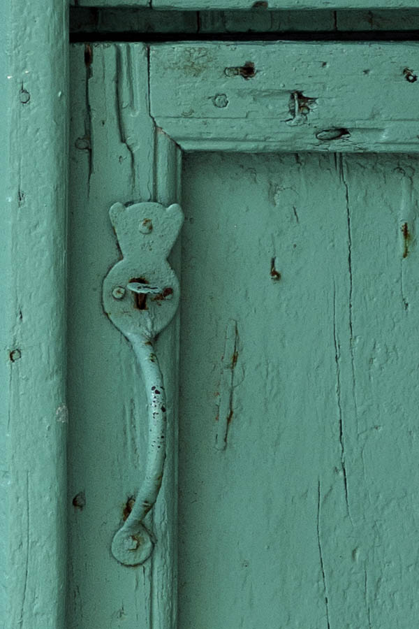 Photo 26703: Worn, light green, panelled double door (one half door)