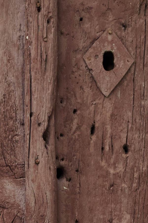 Photo 26705: Worn, brown double door of boards