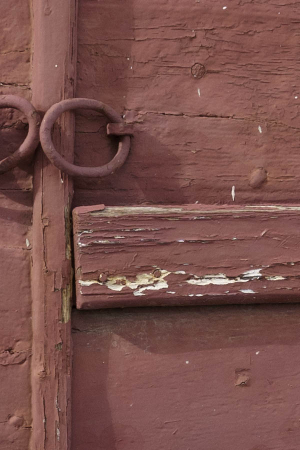 Photo 26761: Narrow, red double door made of boards