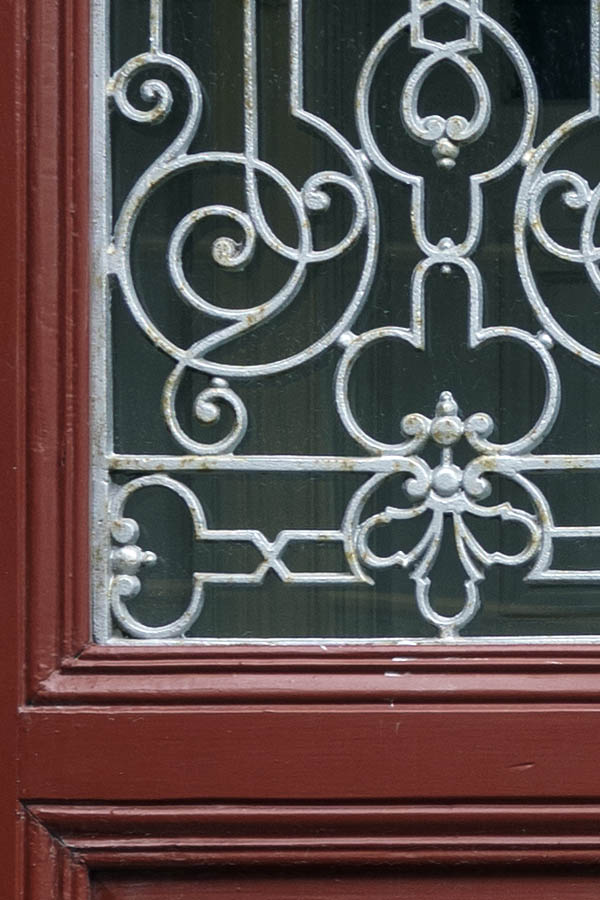 Photo 27083: Panelled, red double door with white lattice