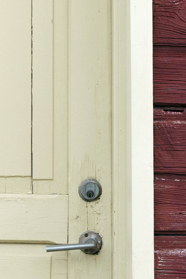 Photo 27127: Worn, yellow, panelled door