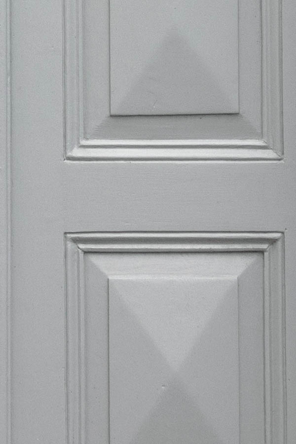 Photo 27134: Panelled, grey double doow with white frame and diamond-shaped door lights