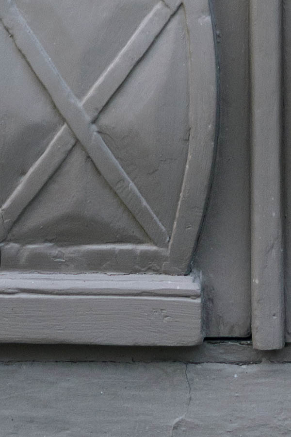 Photo 27176: Panelled, carved, grey double door with round door lights. 