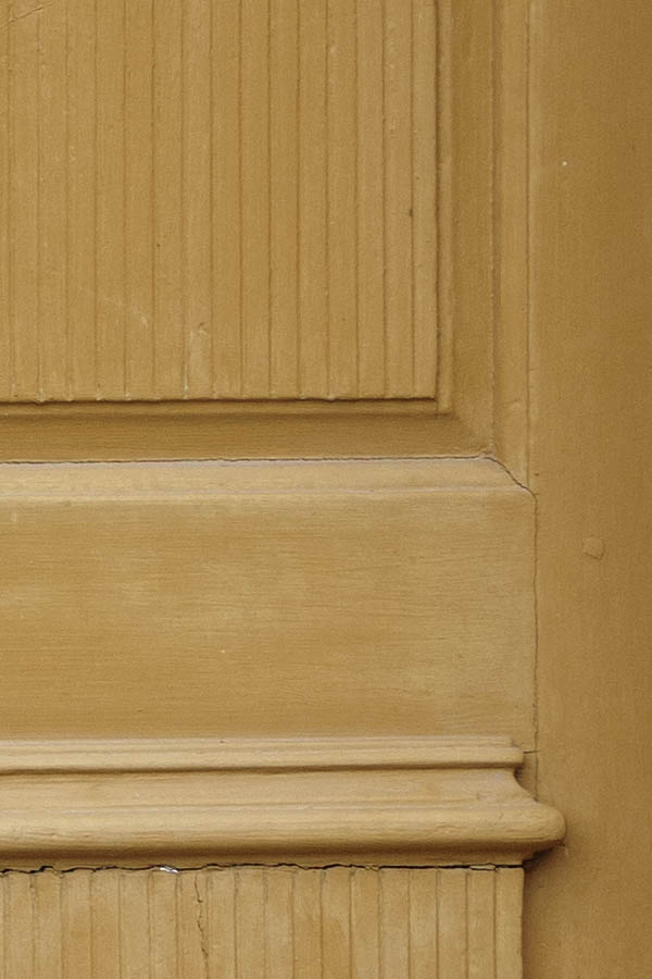 Photo 27210: Panelled, carved, yellow double door with oval top windows