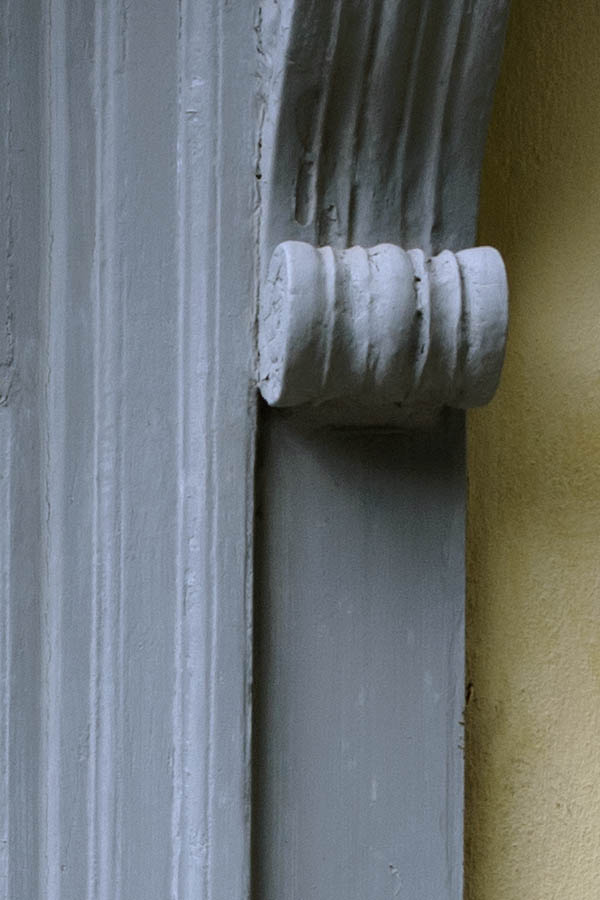 Photo 27287: Grey, panelled double door with top window and large, carved pilastre