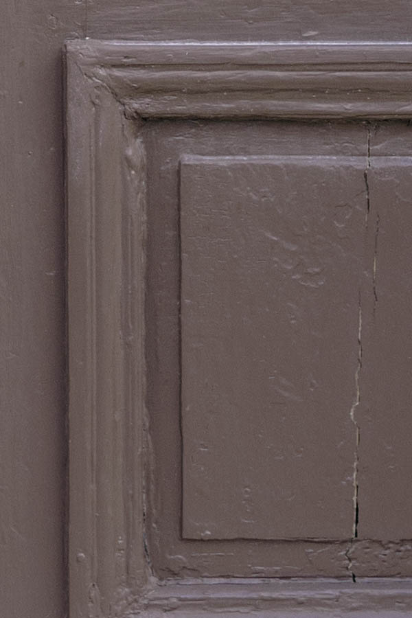 Photo 27316: Worn, panelled, brown double door with top window