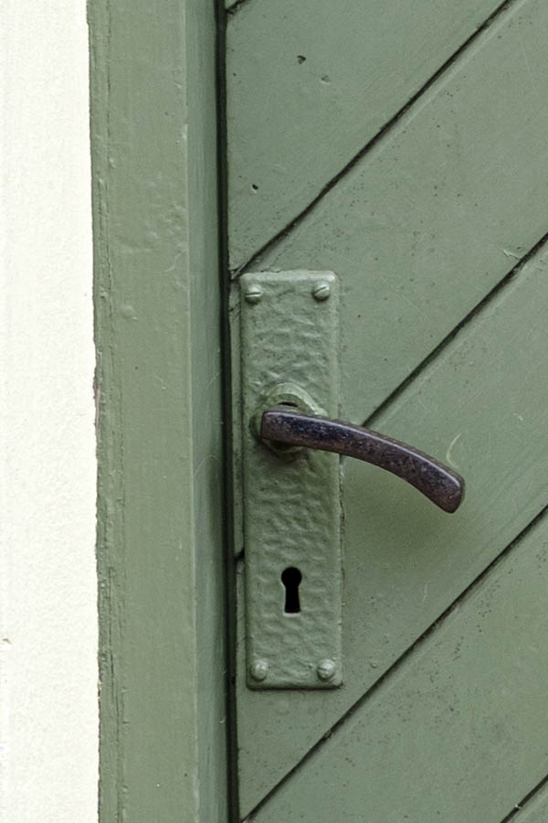 Photo 27337: Light green door of diagonal boards