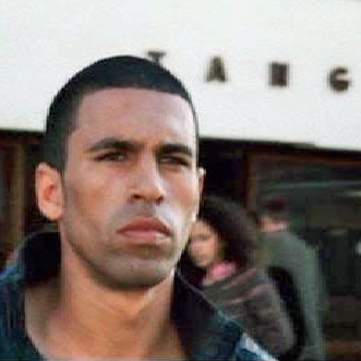 Assassin no. 7, Desh, out of Casablanca. They have a struggle, and Bourne kills Desh.