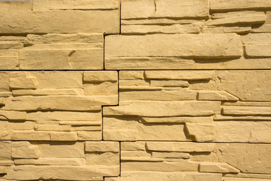 Photo 25382: Wall of irregular, yellow tiles