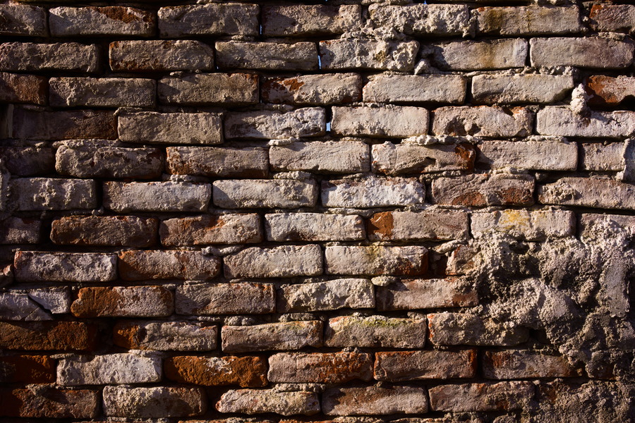 Photo 27420: Rough wall of red bricks