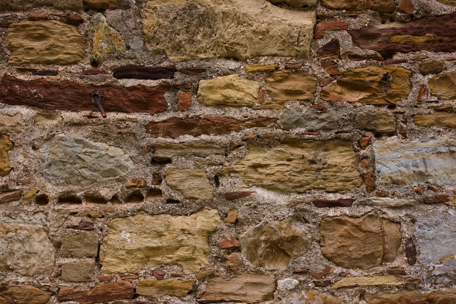 Photo 27434: Decayed brick wall in red, yellow and brown colours and remaining mortar