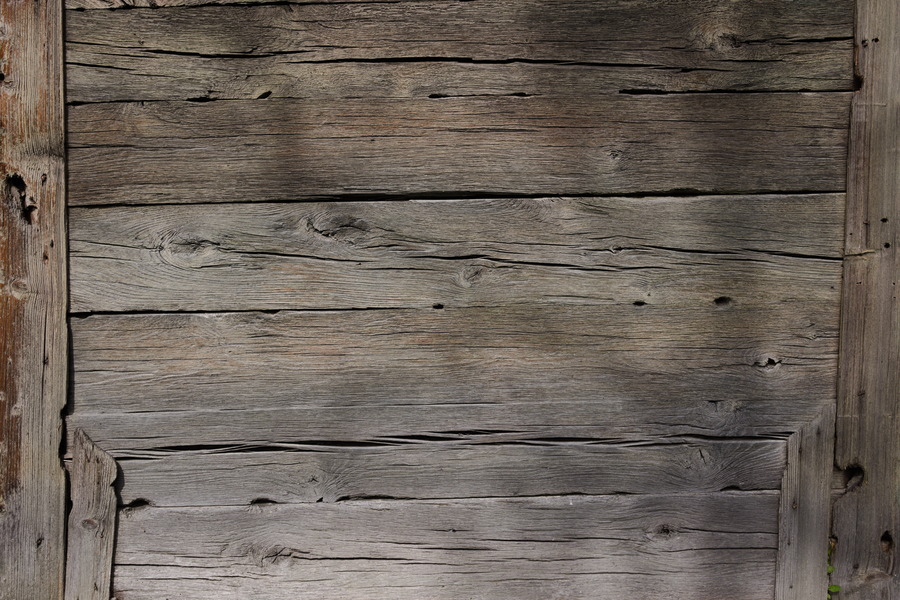 Photo 27519: Wall of unpainted boards.