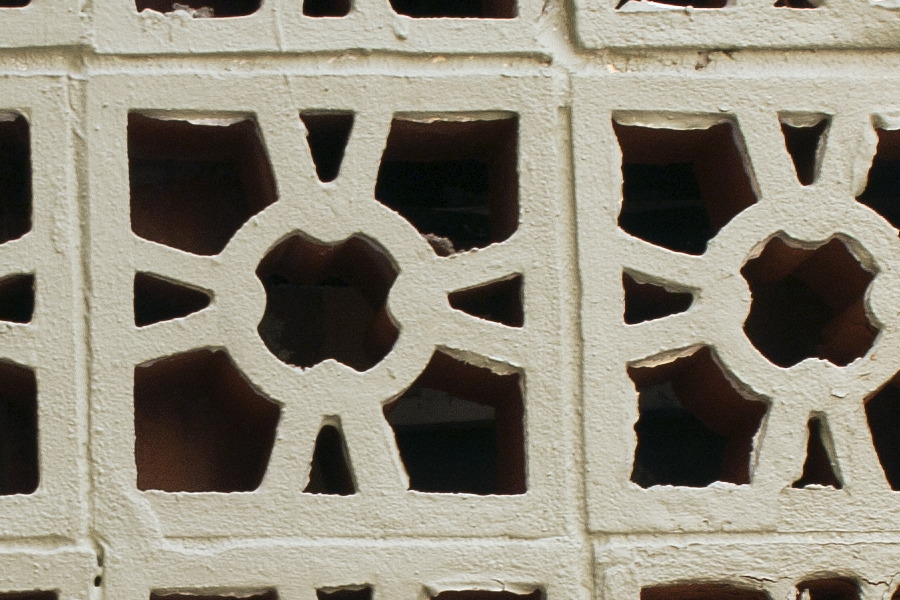 Photo 03016: Plastered, light red wall with opening blocked by grey bricks