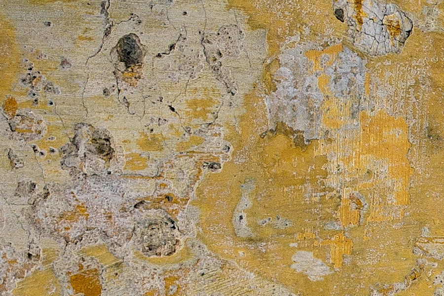 Photo 24256: Worn, plastered wall in yellow and white colours