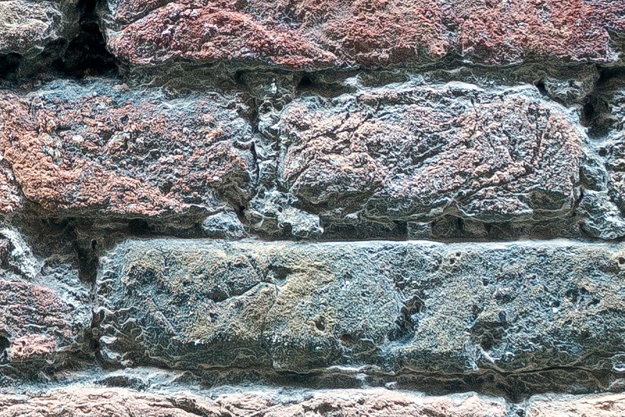 Photo 24787: Worn brick wall in red, yellow and blue colours