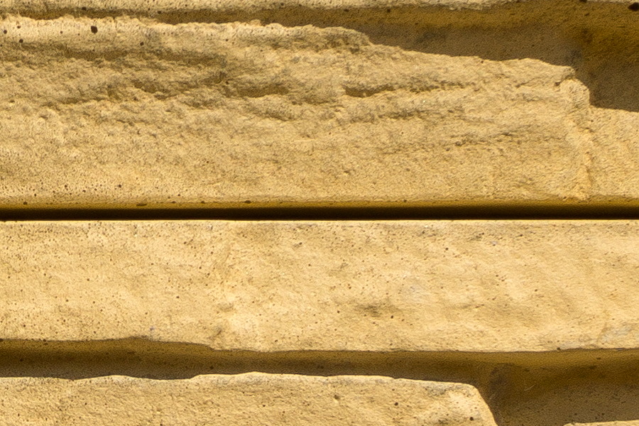 Photo 25382: Wall of irregular, yellow tiles