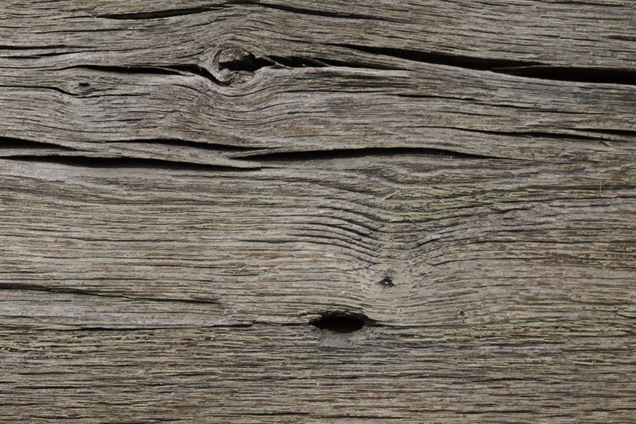 Photo 27519: Wall of unpainted boards.